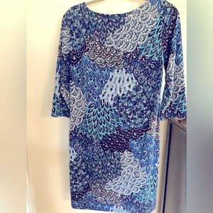 Women’s dress, 3/4 length sleeves. Blue print, rhinestone studs, shell designs.